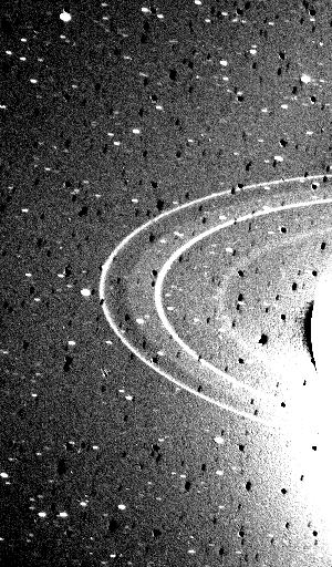 The rings of Neptune imaged by NASA's Voyager 2 spacecraft, showing two faint main rings