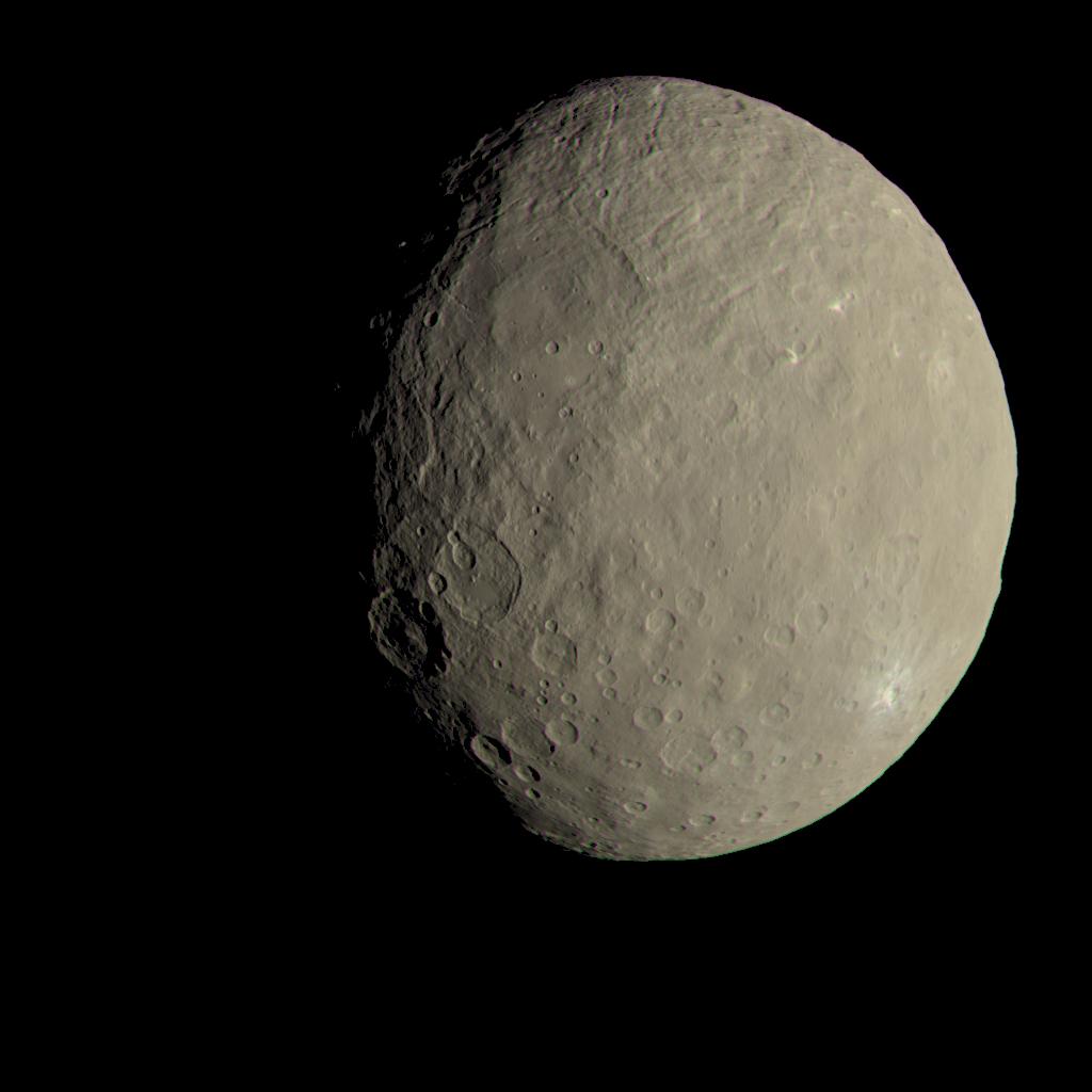 Full-disk color view of the dwarf planet Ceres from NASA's Dawn spacecraft, with the bright spots of Occator Crater near the limb