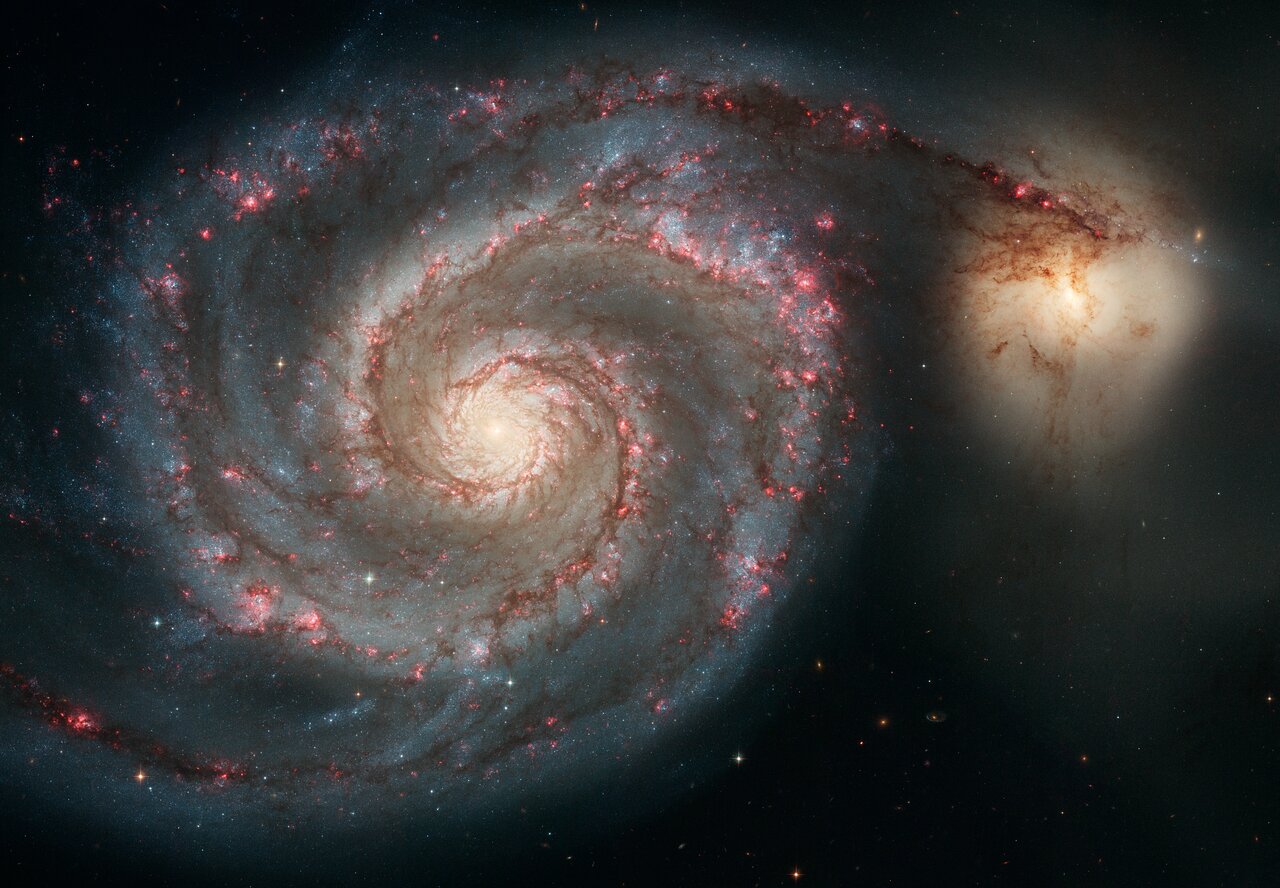 Hubble image of the Whirlpool Galaxy M51 and its companion NGC 5195.