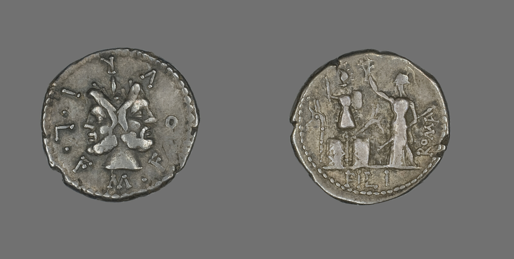 Janus depicted with two faces looking forward and back